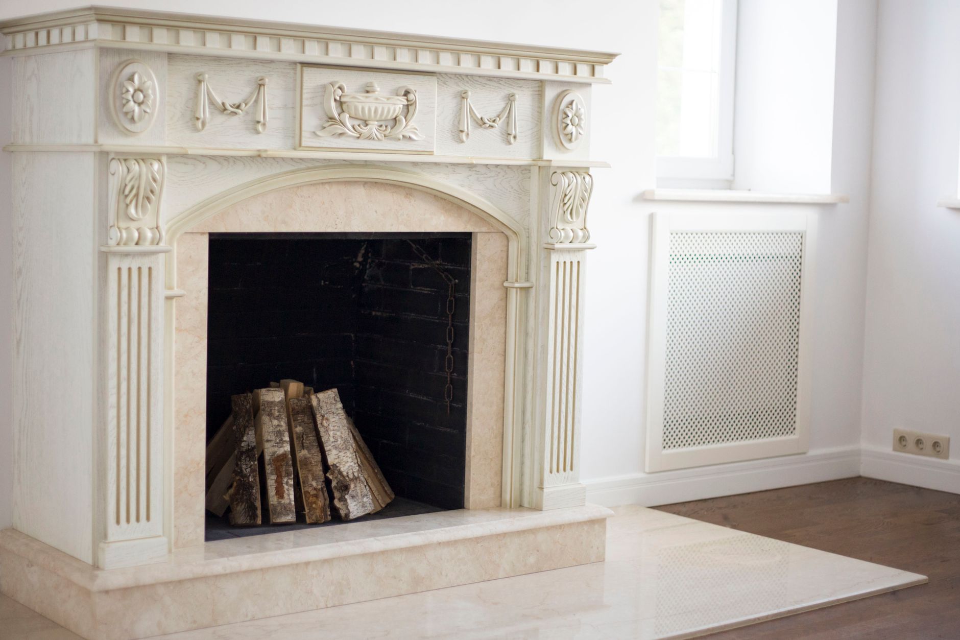 Gas insert glowing inside a masonry firebox